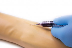 Training arm for intravenous injection and infusion